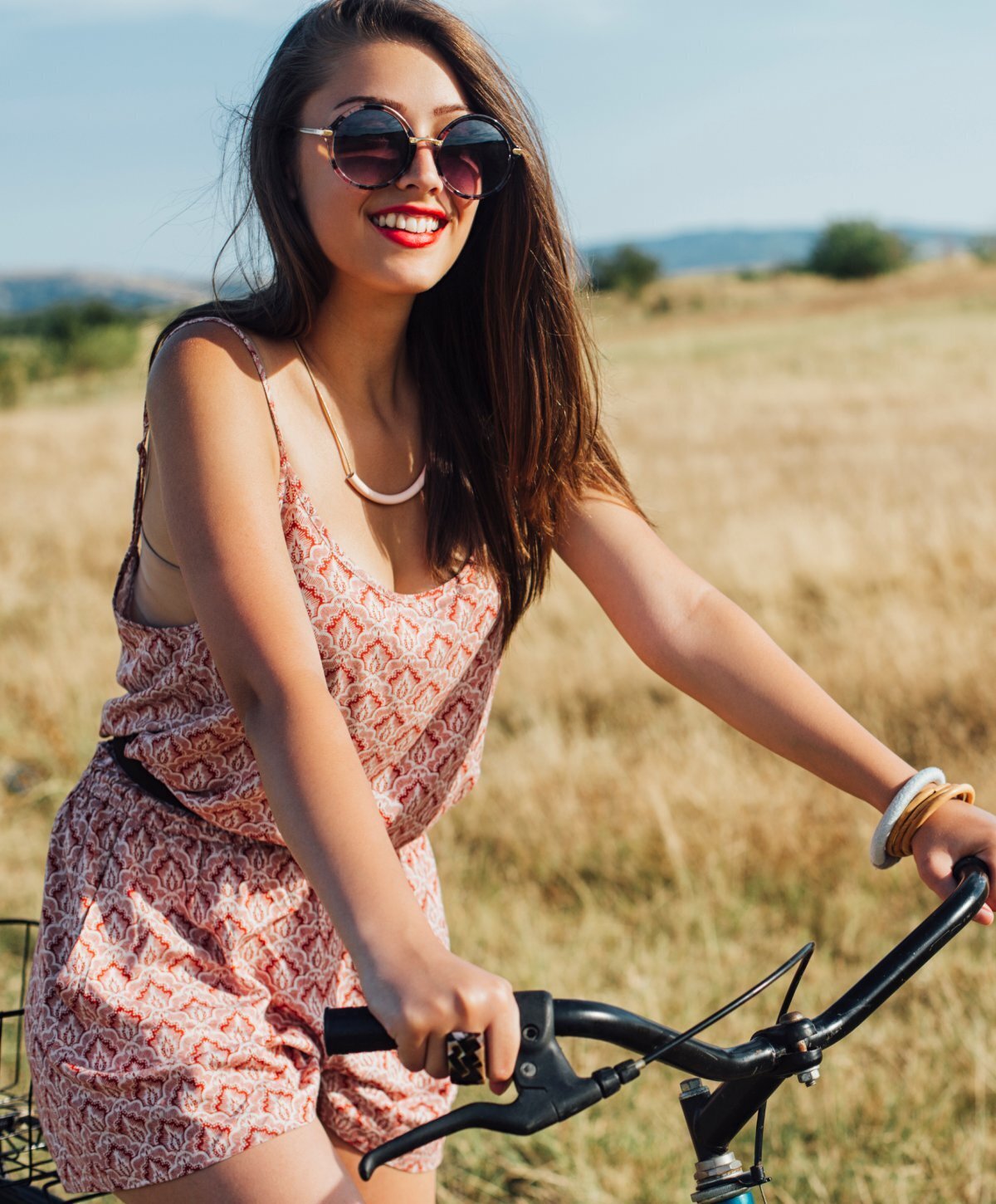 Grand Rapids Brachioplasty client riding a bicycle