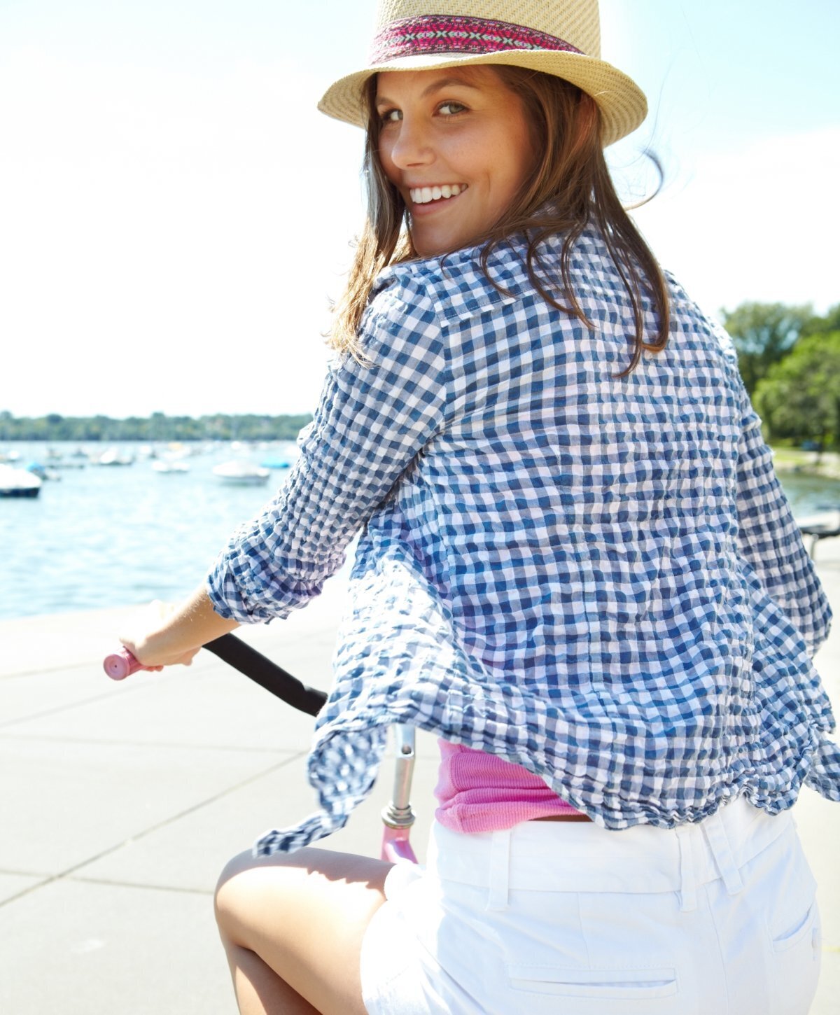 Mommy Makeover client riding a bicycle