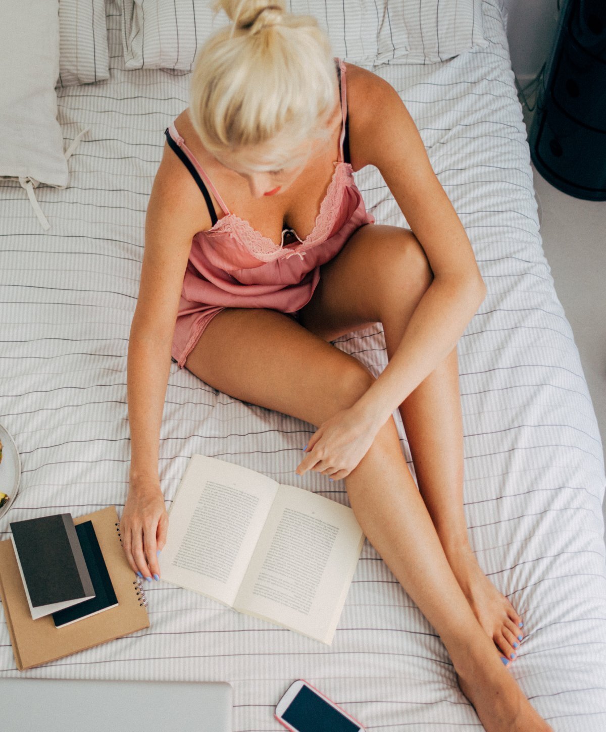 grand rapids secondary breast reconstruction model reading a book