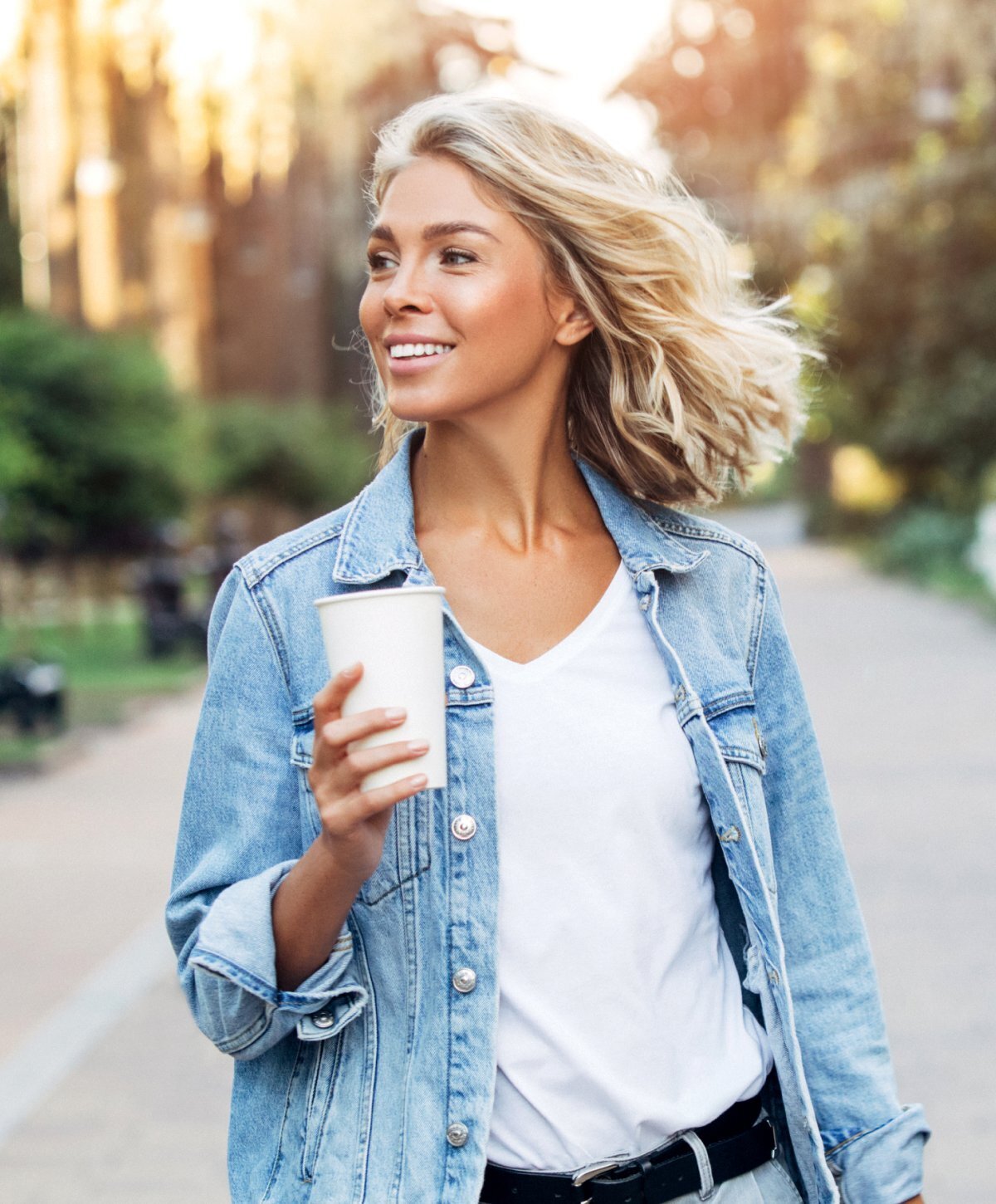 Grand Rapids Nutrafol patient model with coffee cup