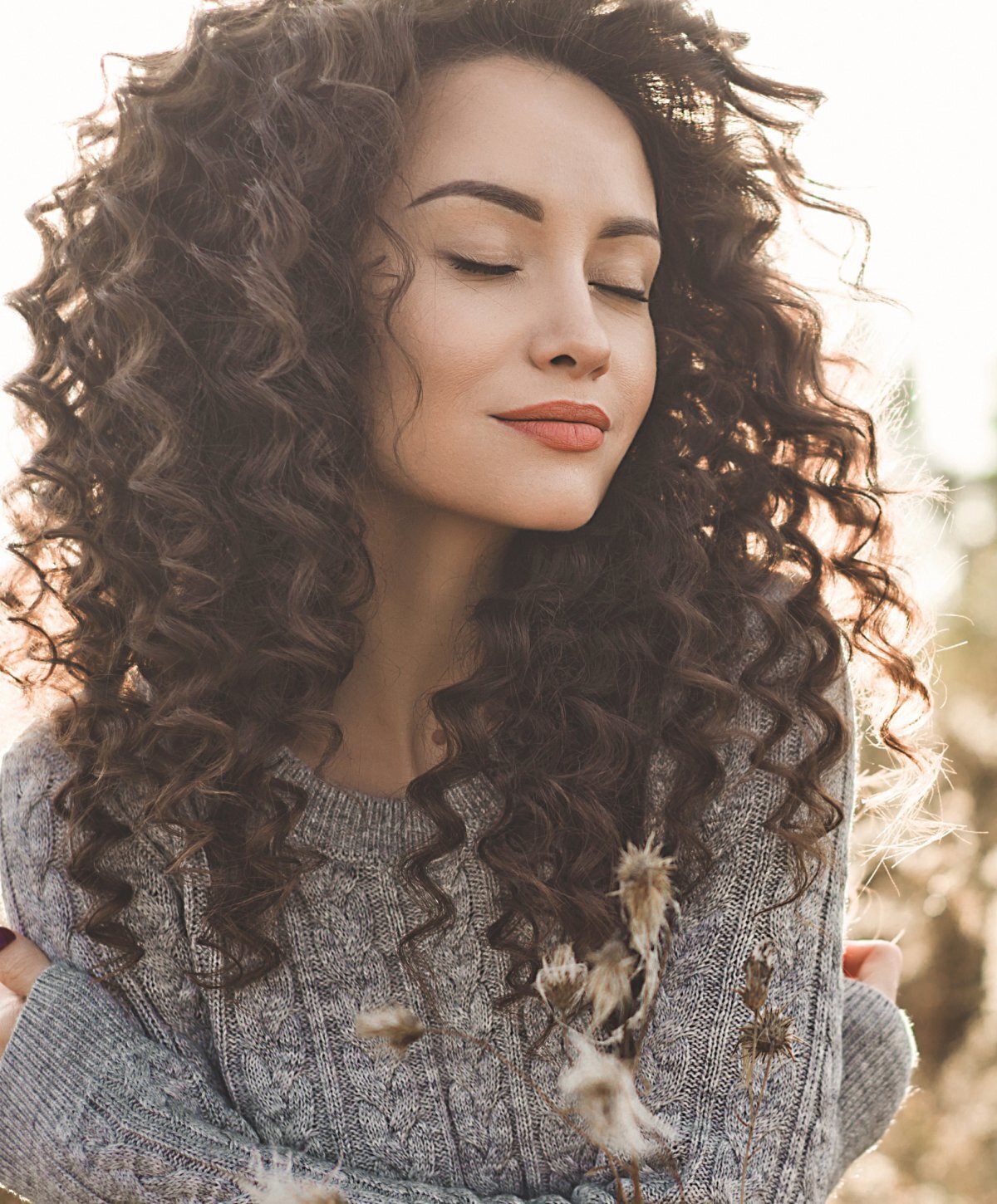 Grand Rapids Juvéderm Volux patient model with curly hair