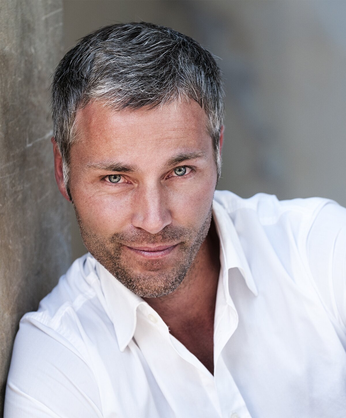 Grand Rapids men's skincare model with white shirt