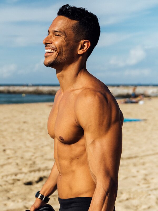 Grand Rapids Tummy Tuck for Men model on beach